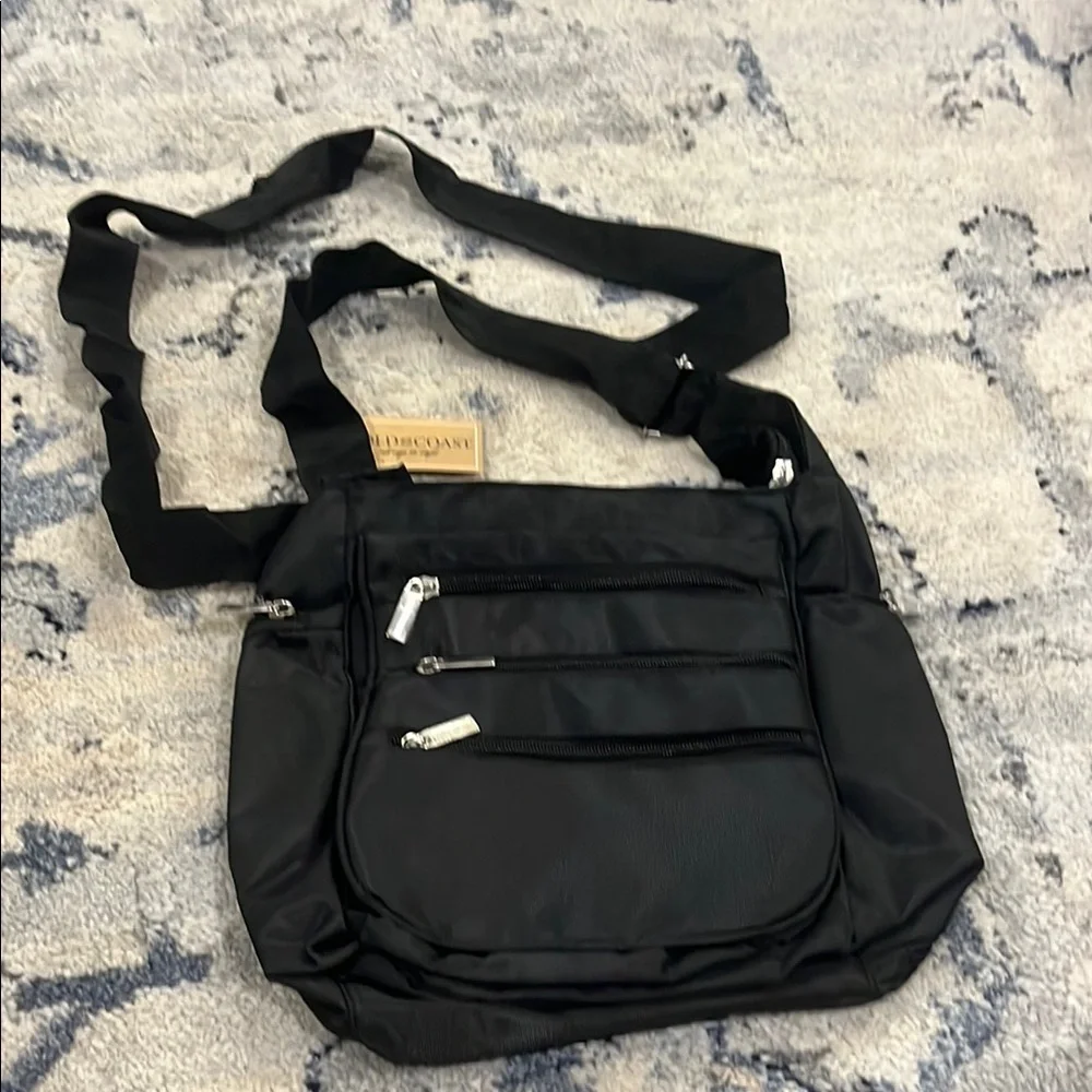 Black Messenger Bag with Adjustable Strap and Durable Fabric